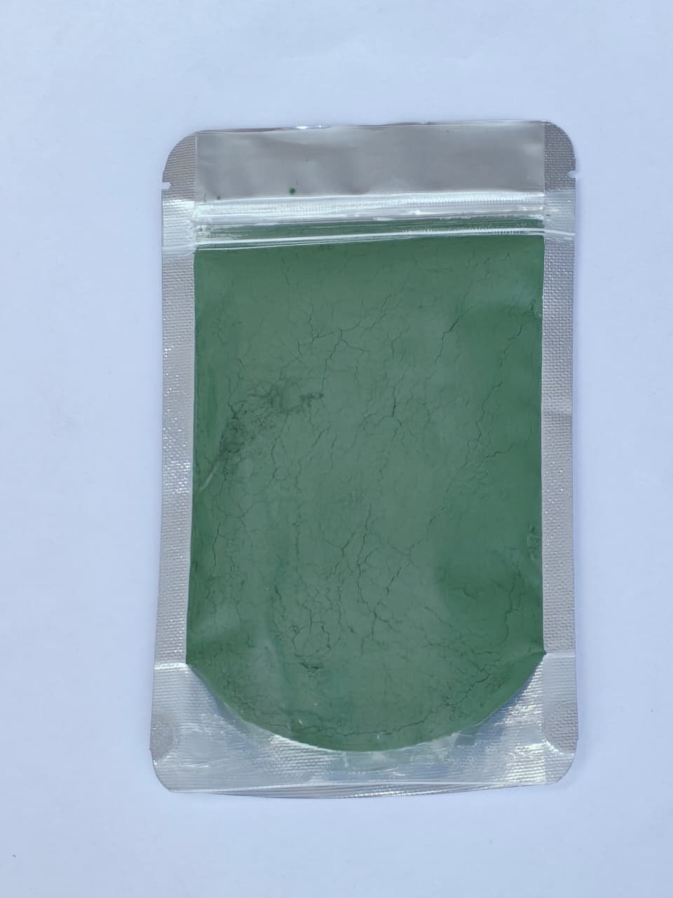 Green Body Pigment in a sealed packet
