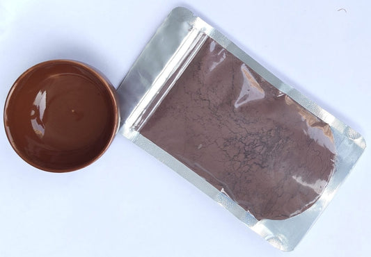 Red Brown Glaze in a sealed packet with a bowl on the side with same shade