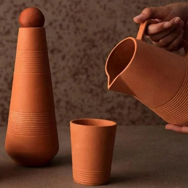 handmade terracotta bottle, jug and glass for water and beverages