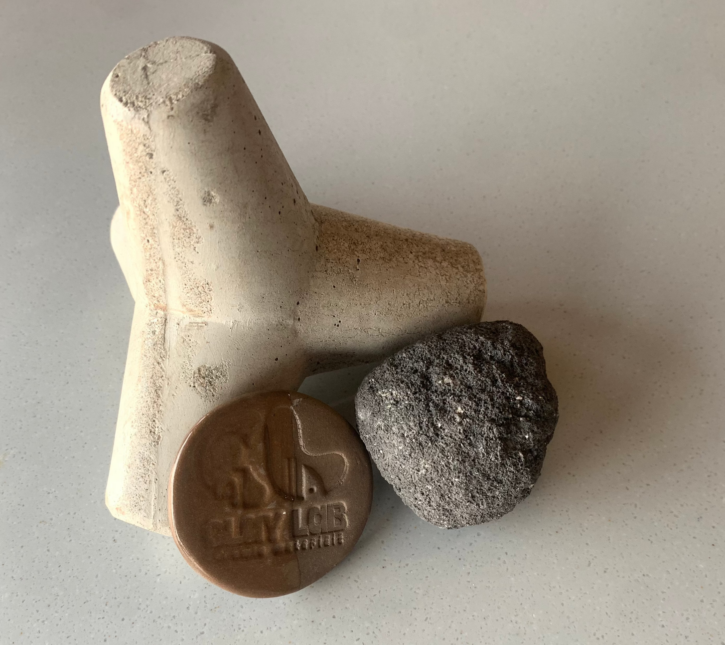 Picture showing products made from dark brown stoneware clay