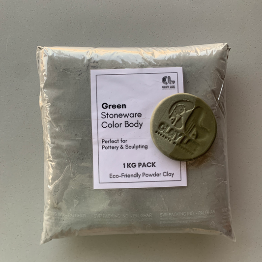 A 1 KG pack of green stoneware color body powder clay, with a label on the front.