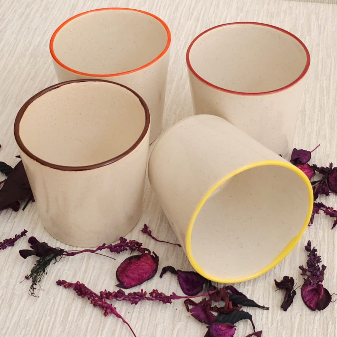 Juice glasses with white glaze crafted with Clay labs buff stoneware clay