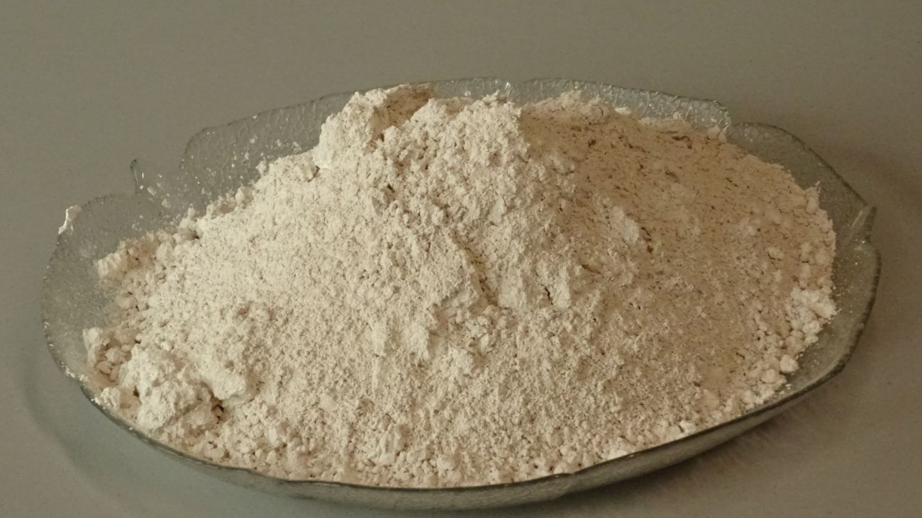 white stoneware clay powder in a bowl
