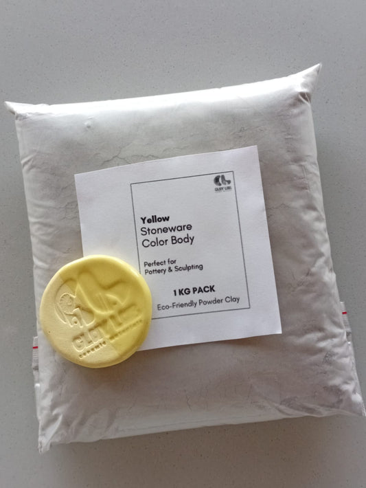 A clay pack of 1 kg labelled with yellow stoneware color body